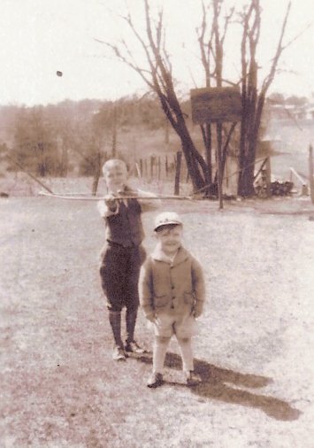 Young James and boy with bow